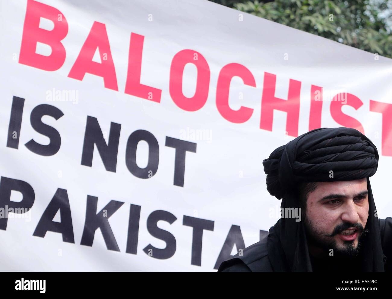 Baloch Führer Dilshad Mazdak Baloch alle Indien Baloch Einheit Forum, inszeniert einen Protest gegen Pakistan Hochkommissariat New Delhi Stockfoto