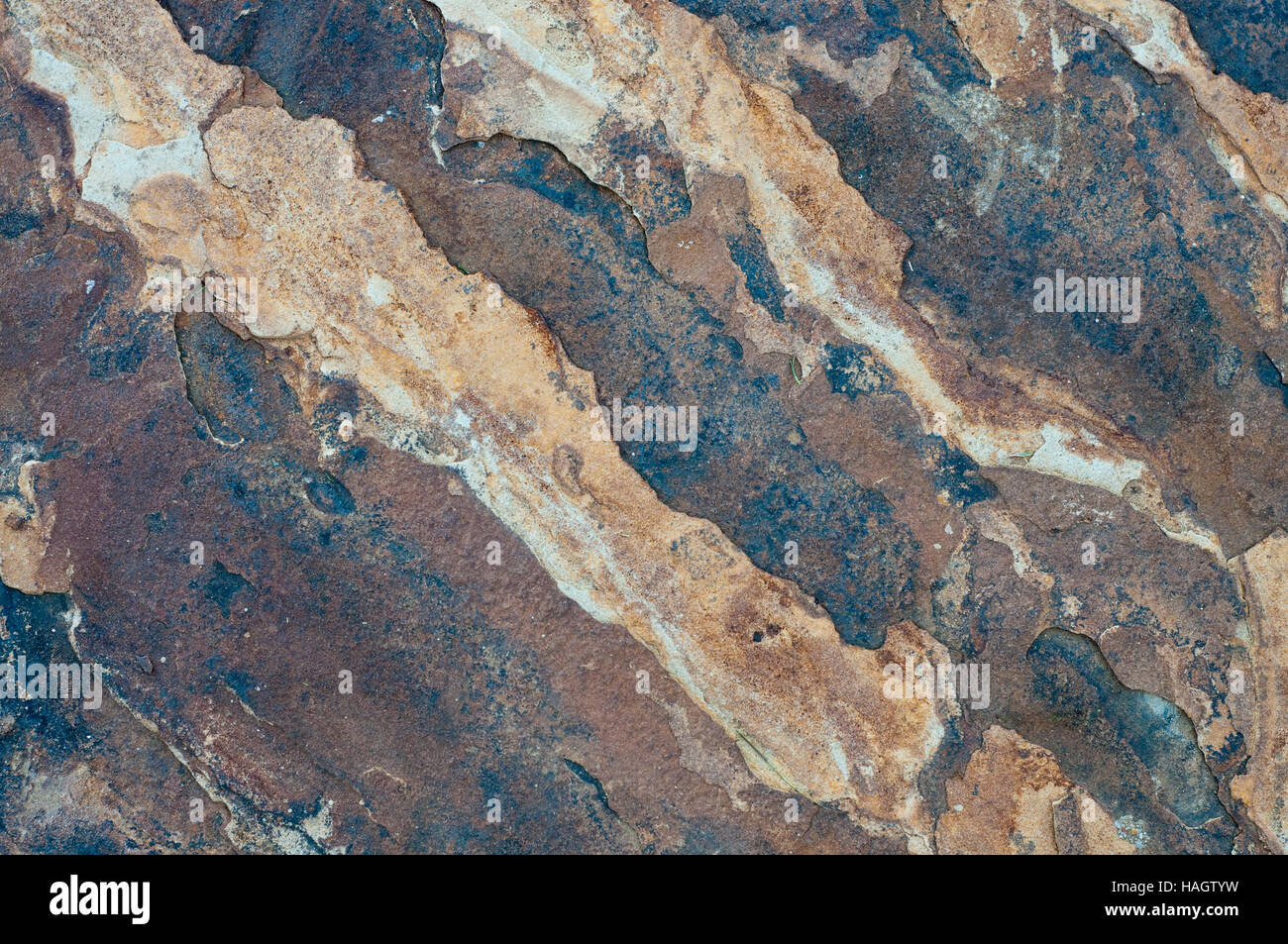 Hintergrund der Steinplatte Fels Textur Nahaufnahme. Stockfoto