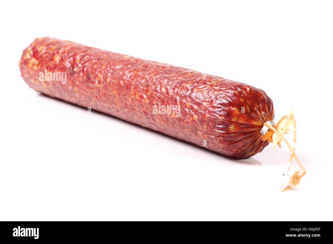 Salami Wurst isoliert auf weiss Stockfoto