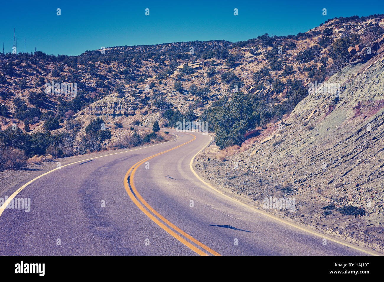 Vintage getönten gebogene Panoramastraße, Reisen Konzept Hintergrund, Colorado National Monument, Colorado, USA Stockfoto