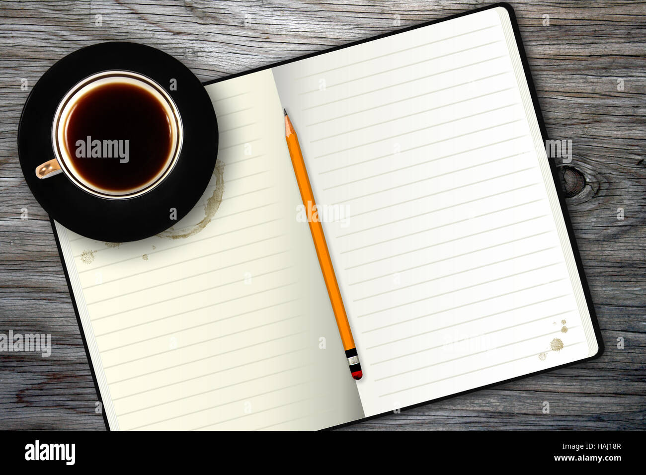 Notebook und Kaffee Tasse Stockfoto