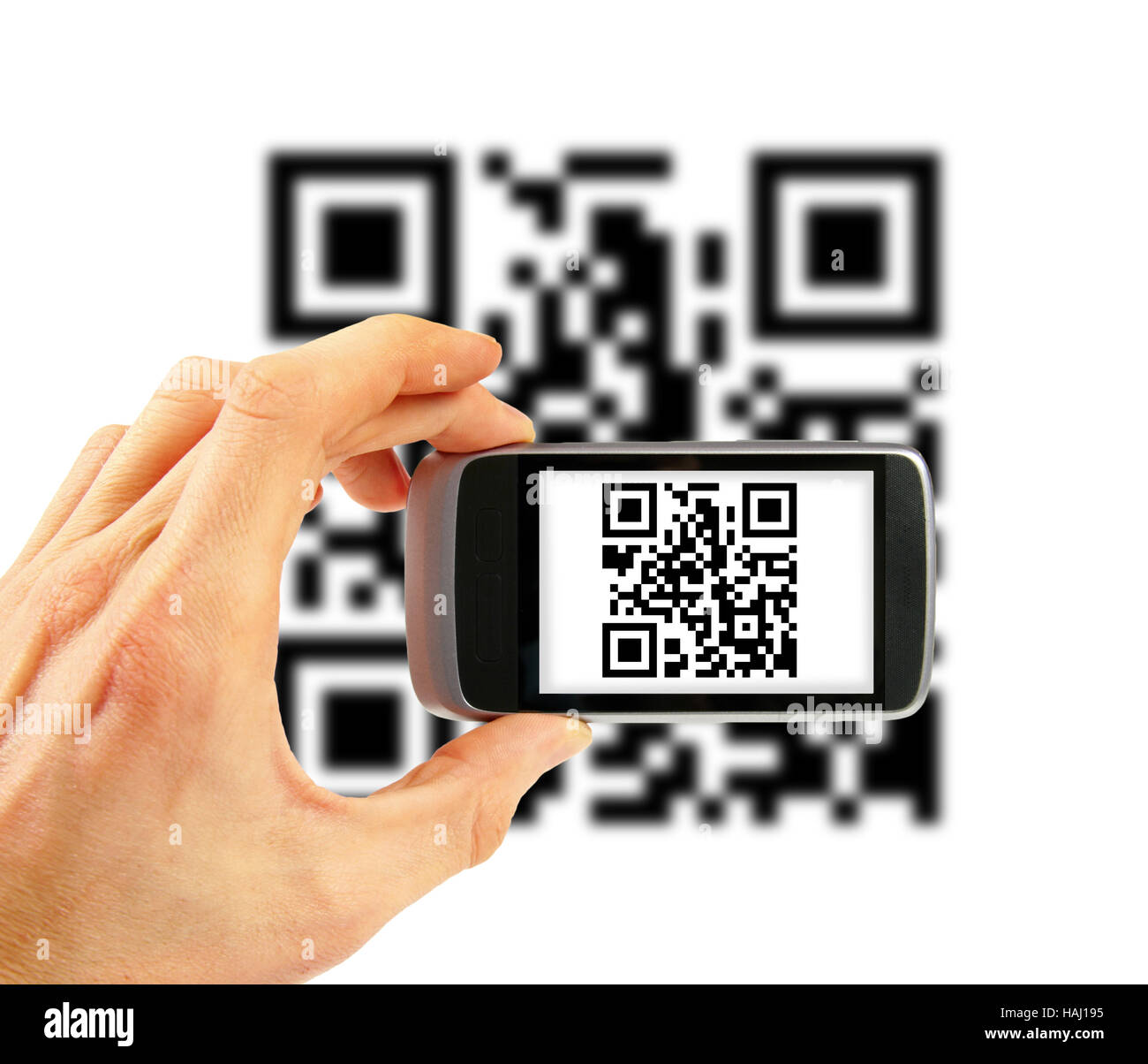 Hand mit Handy QR-Code Scannen Stockfoto