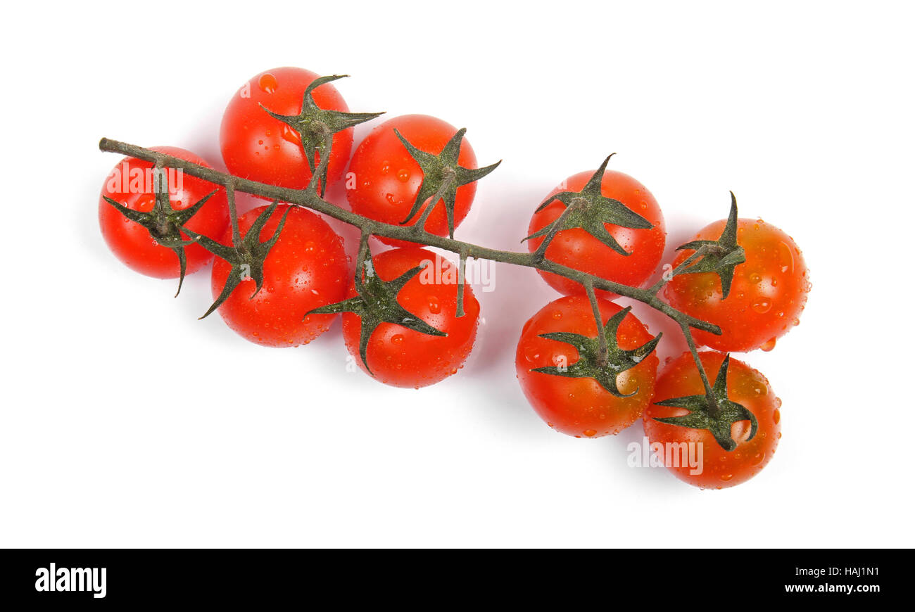 Reihe von Cherry-Tomaten, isoliert auf weiss Stockfoto