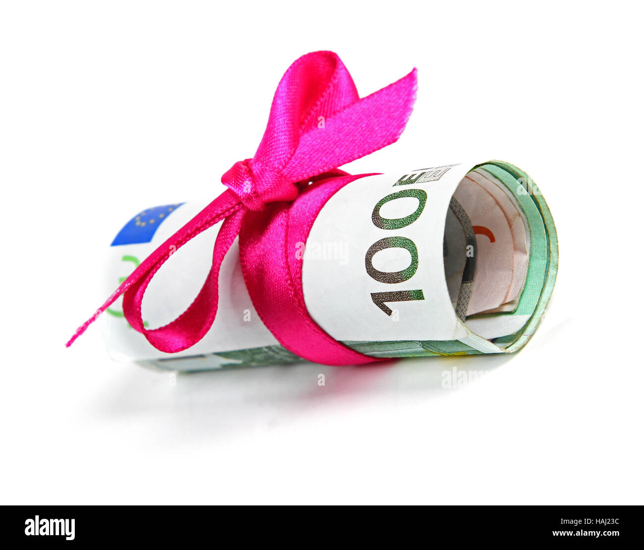 Euro Geld Rollen Geschenk mit rosa Schleife Stockfoto