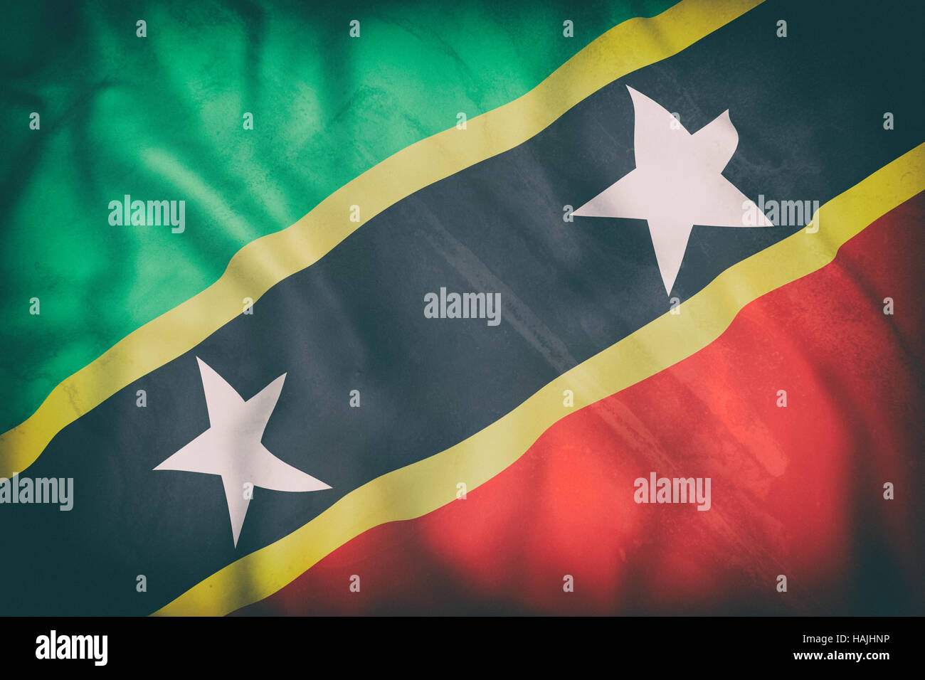 3D Rendering der Föderation eines alten Saint Christopher und Nevis Flagge winken Stockfoto