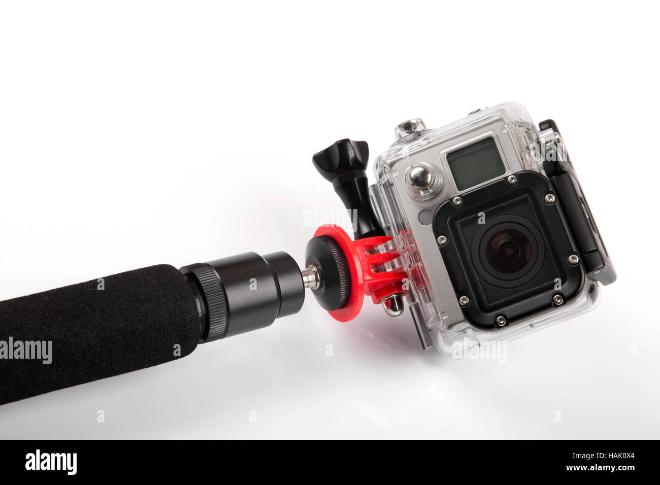 Action-Kamera mit handheld Stock isoliert auf weiss Stockfoto