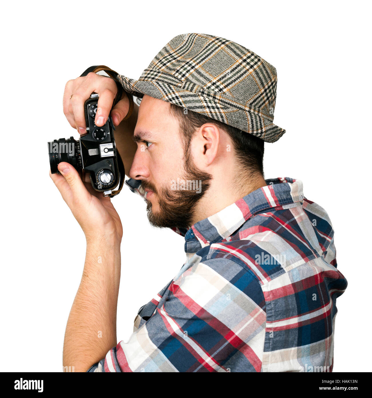 Fotografen nehmen Foto mit Retro-Kamera isoliert auf weißem Hintergrund Stockfoto