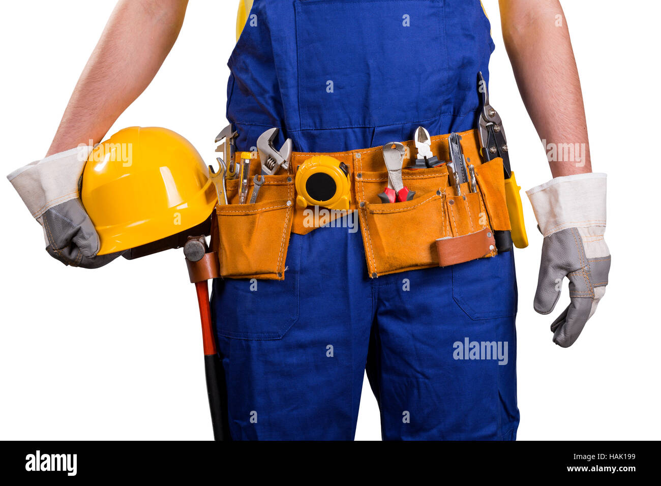 Bauarbeiter mit Werkzeuggürtel isoliert auf weiss Stockfoto