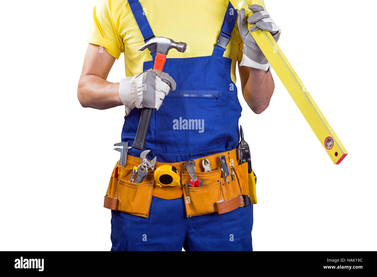 Bauarbeiter mit Gürtel und Werkzeuge in den Händen auf weiß Stockfoto
