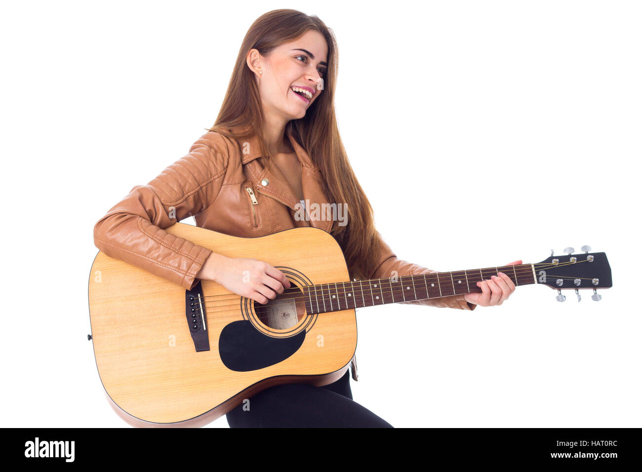 Junge Frau mit einer Gitarre Stockfoto