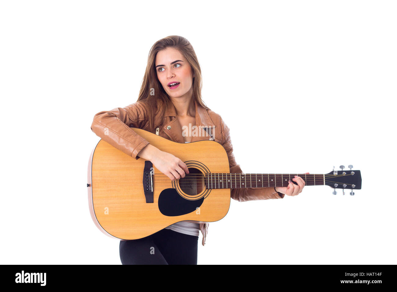 Junge Frau mit einer Gitarre Stockfoto