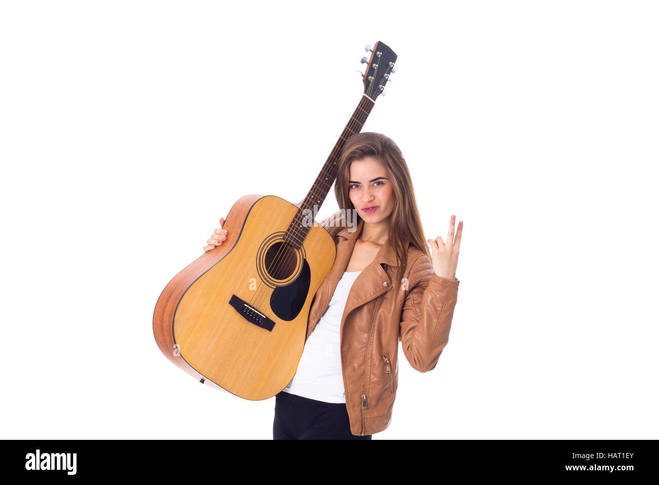 Junge Frau mit einer Gitarre Stockfoto