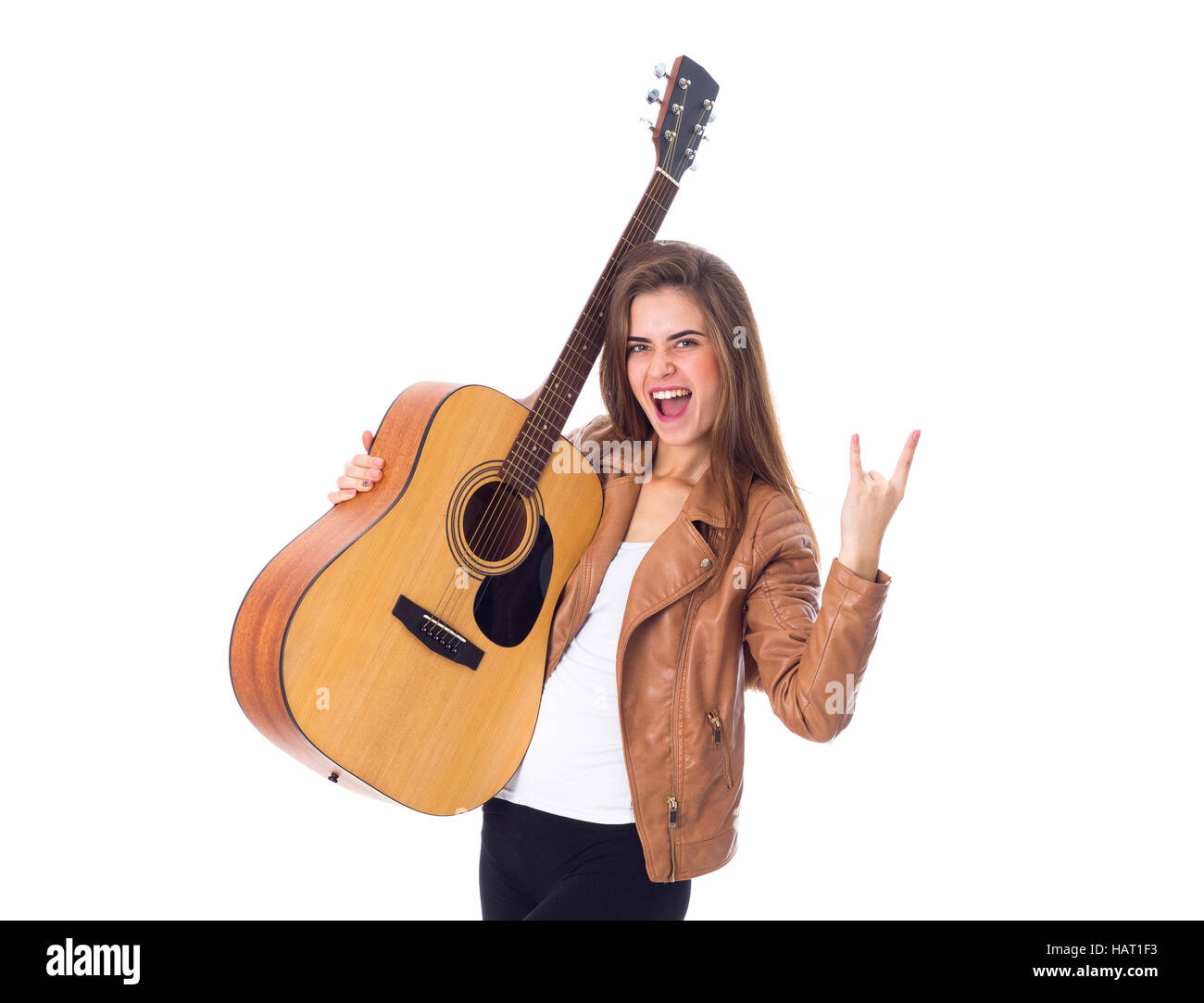 Junge Frau mit einer Gitarre Stockfoto