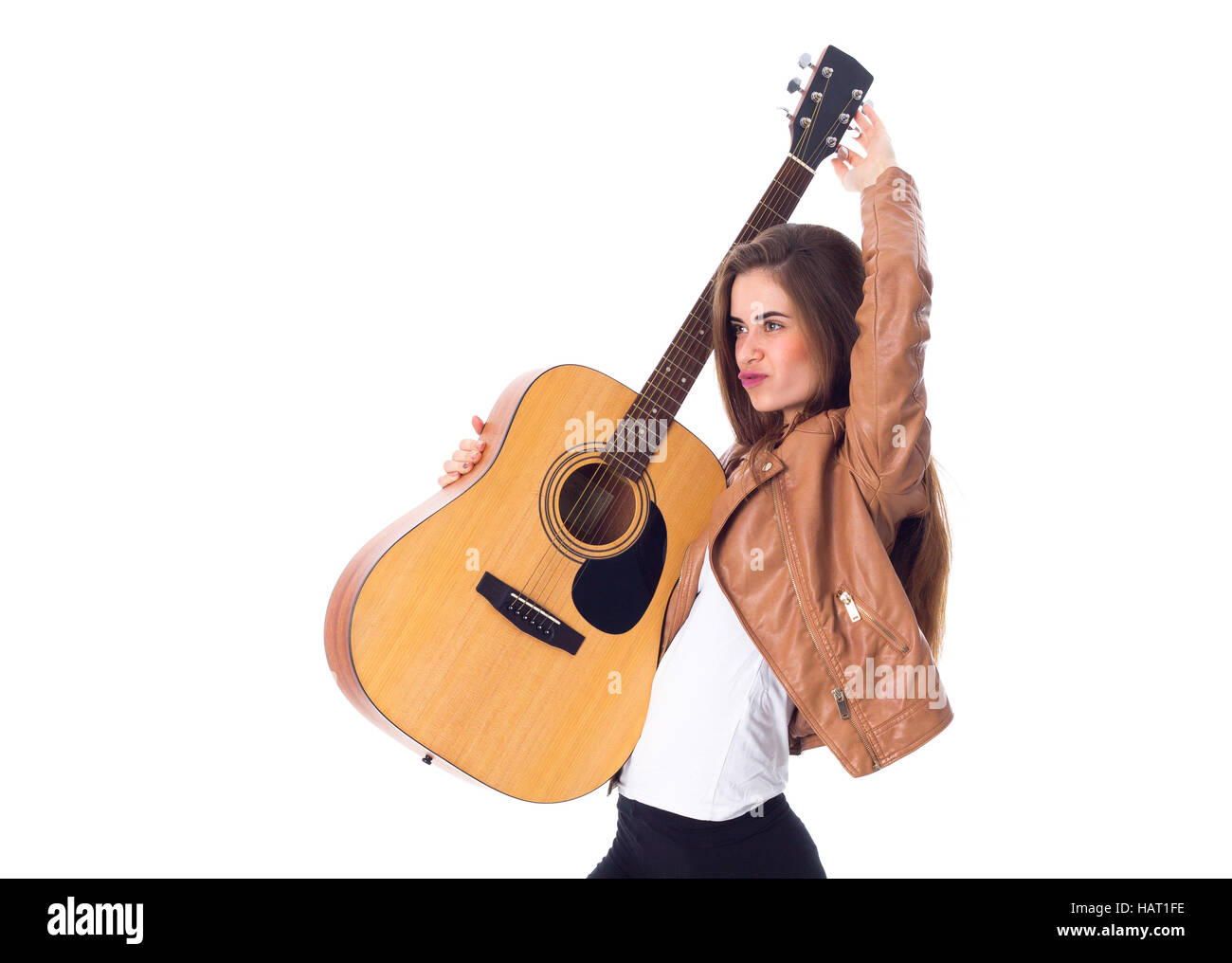 Junge Frau mit einer Gitarre Stockfoto