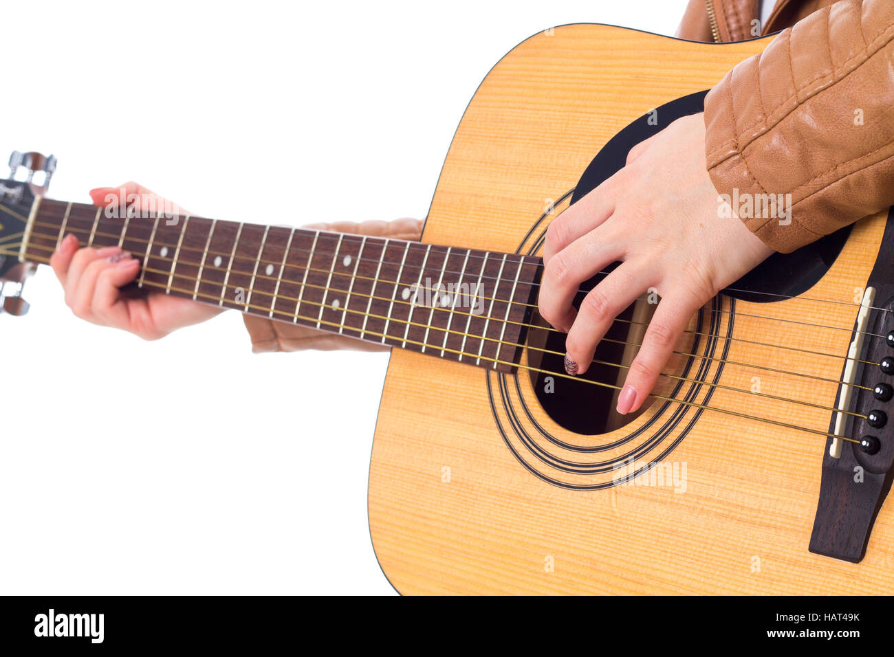 Junge Frau mit einer Gitarre Stockfoto