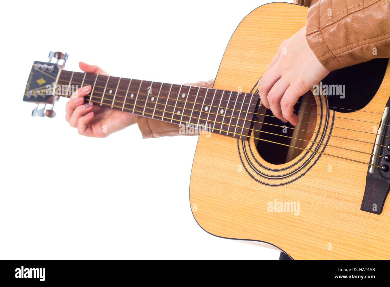 Junge Frau mit einer Gitarre Stockfoto