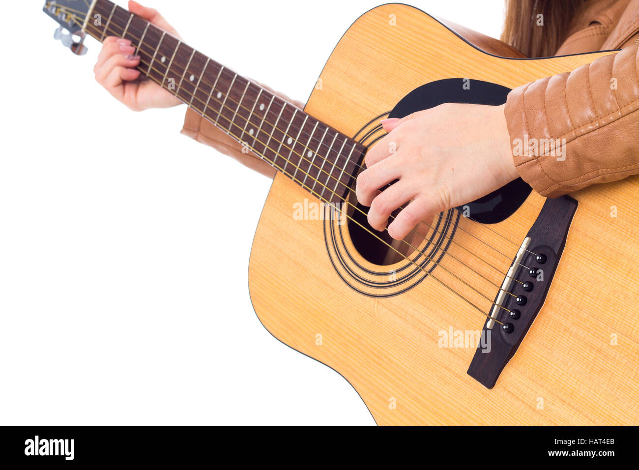 Junge Frau mit einer Gitarre Stockfoto