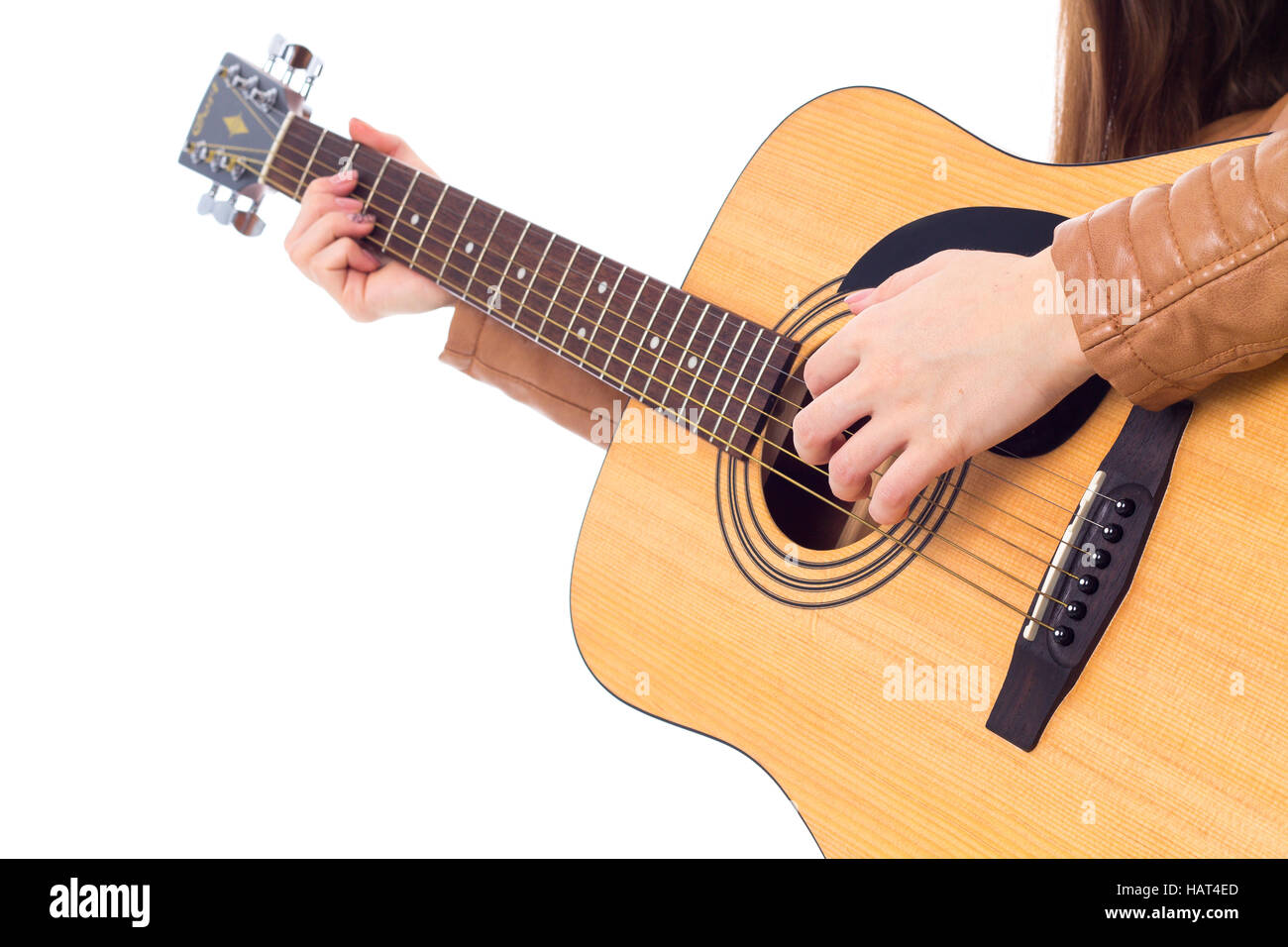 Junge Frau mit einer Gitarre Stockfoto