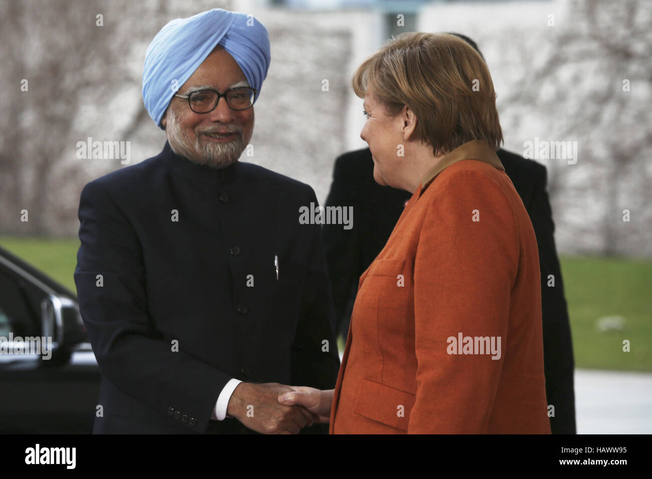 Merkel begrüßt Singh, indischer Premierminister Stockfoto