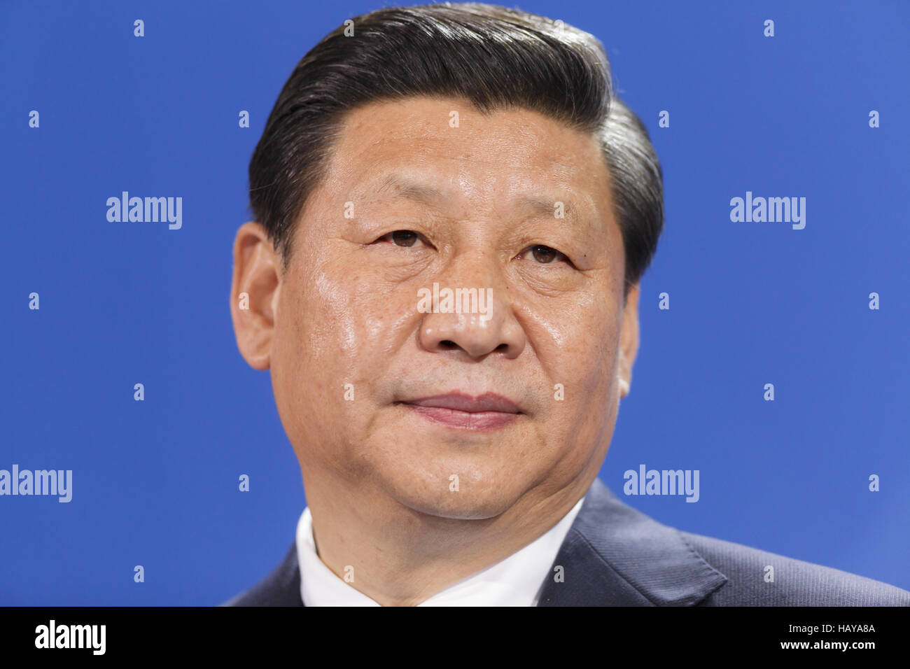 Xi Jinping trifft sich Merkel in Berlin. Stockfoto