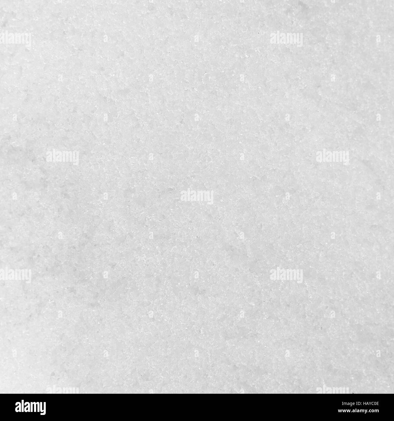 Struktur aus weißem Schnee. Stockfoto