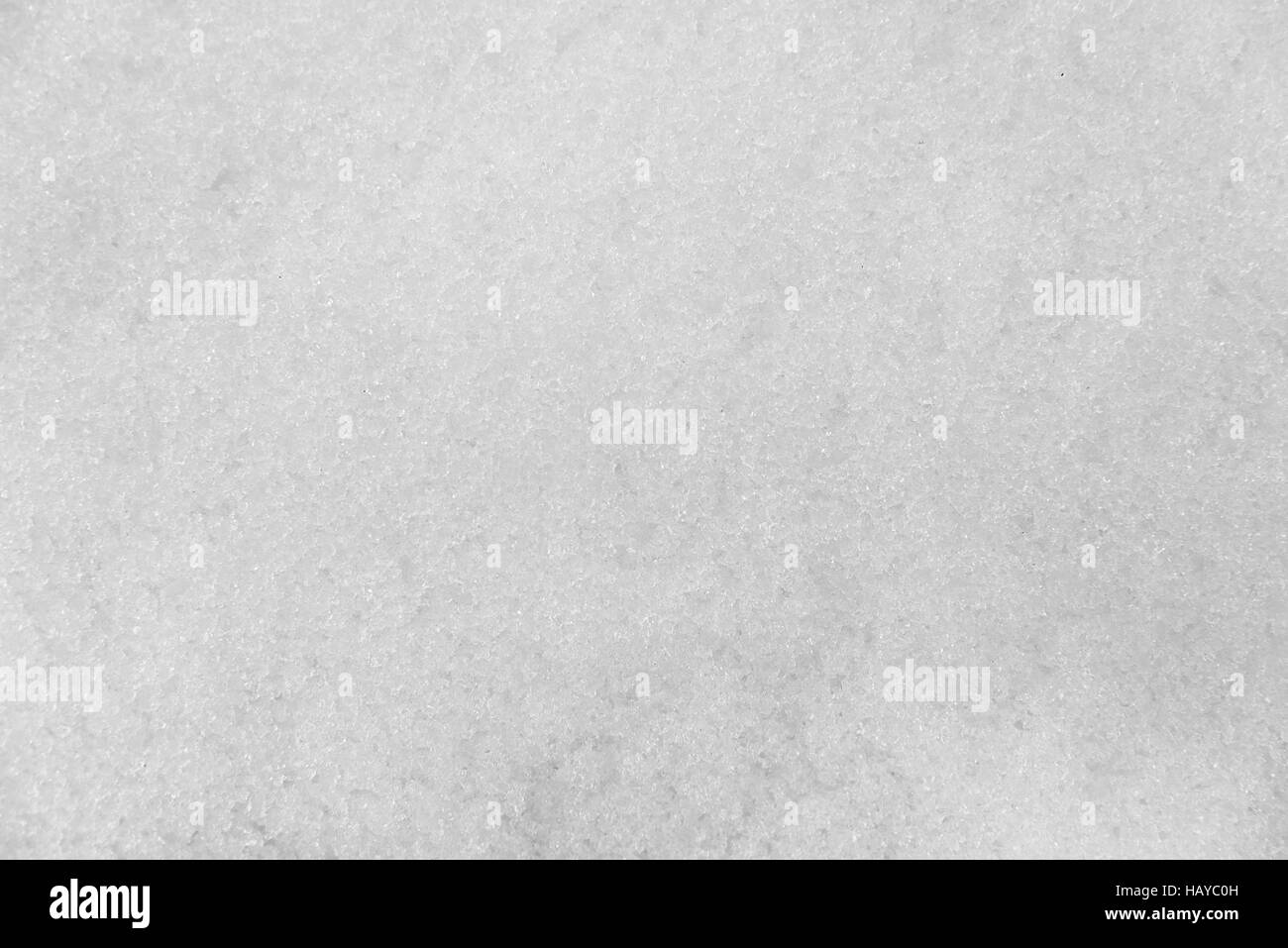 Struktur aus weißem Schnee. Stockfoto