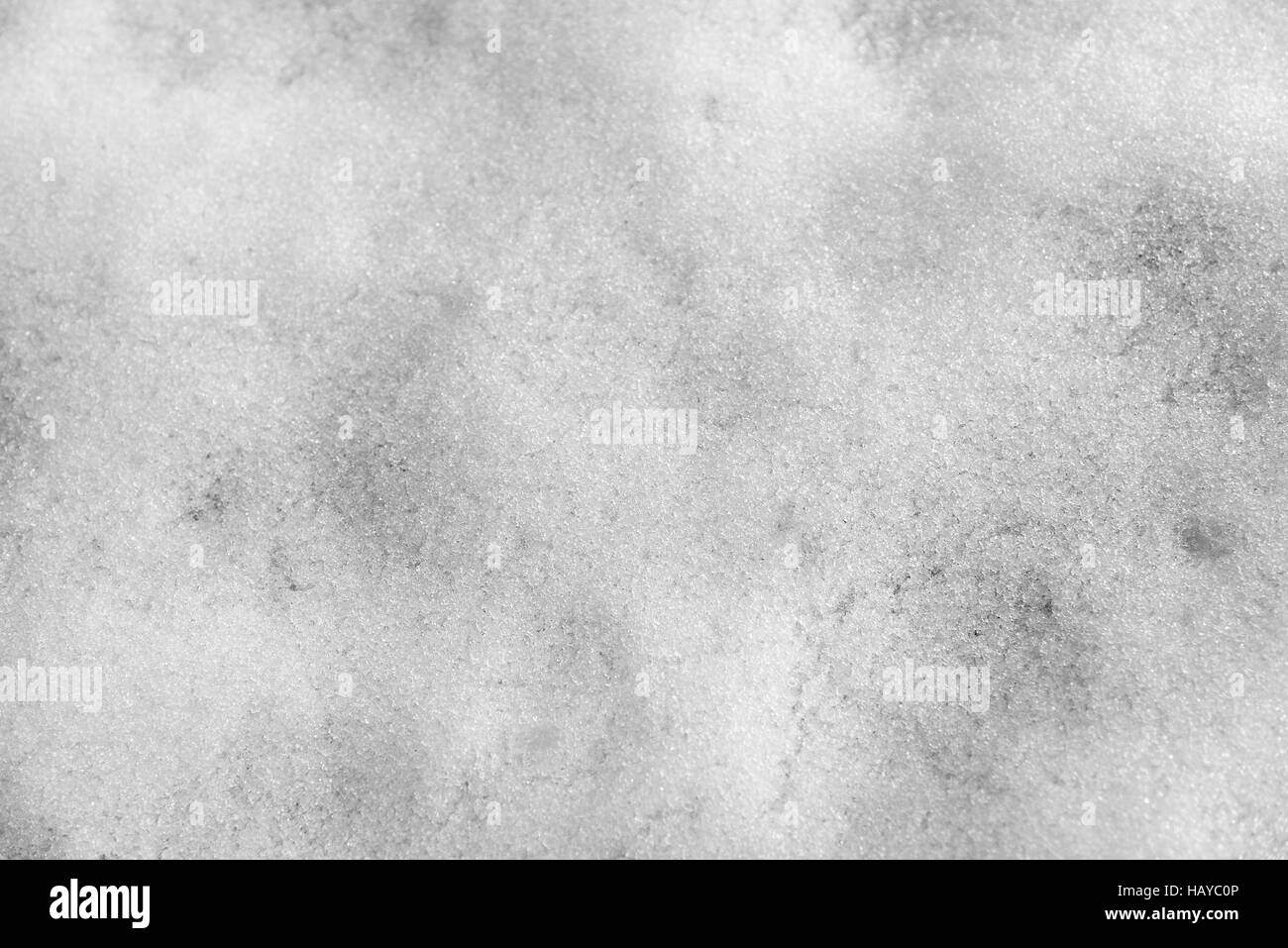 Struktur aus weißem Schnee. Stockfoto