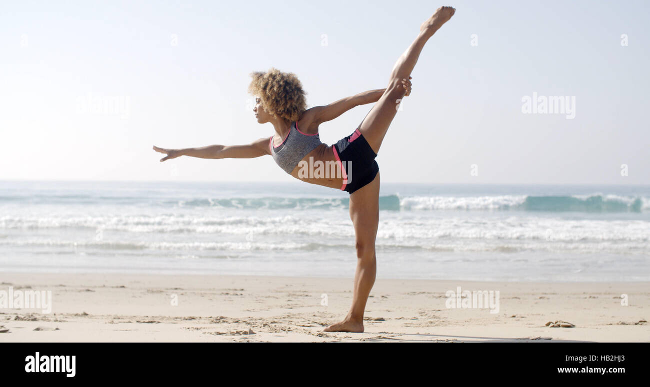 Fit Woman In Yoga-Pose Stockfoto
