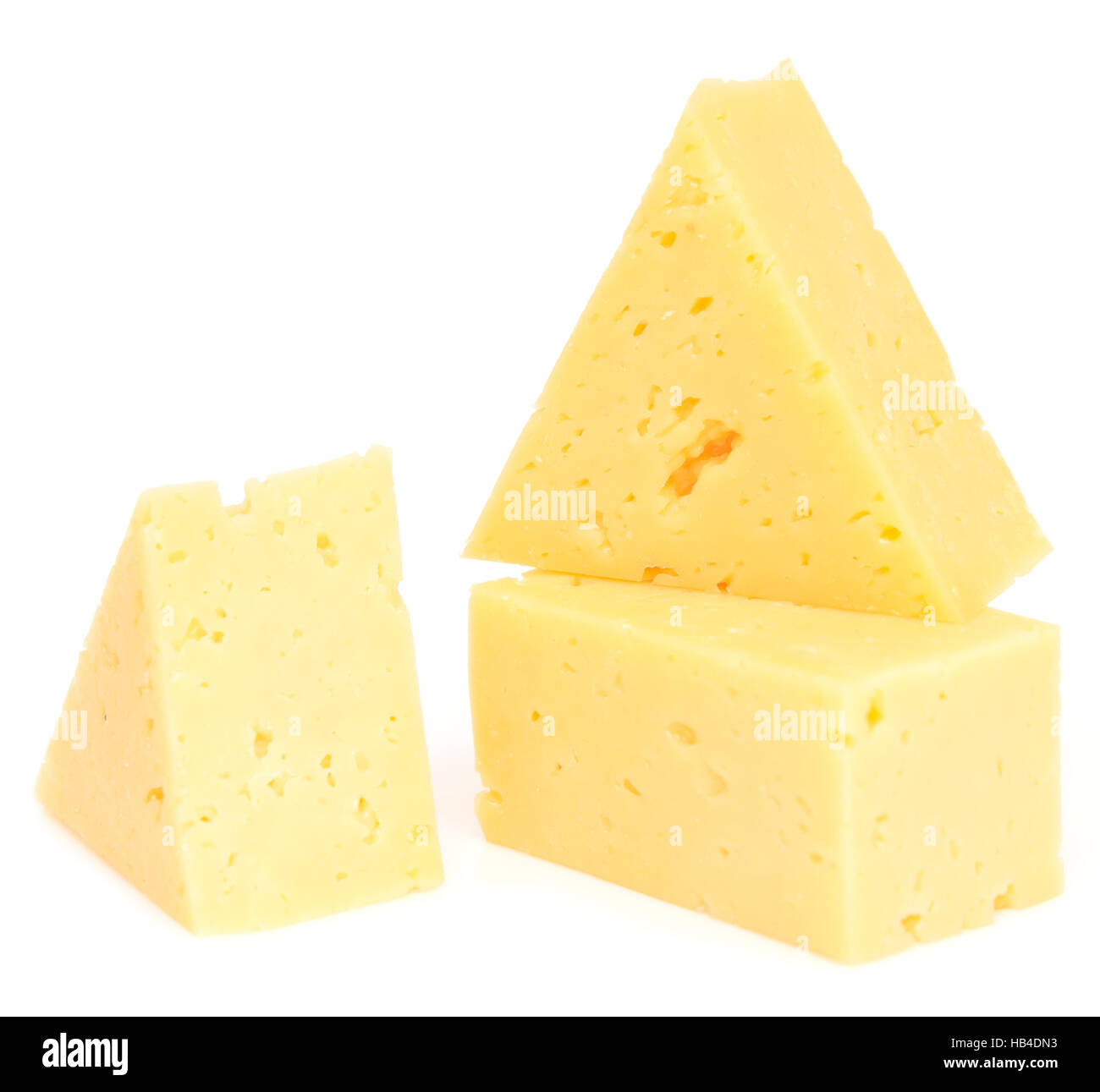 Käsewürfel auf weiß Stockfoto
