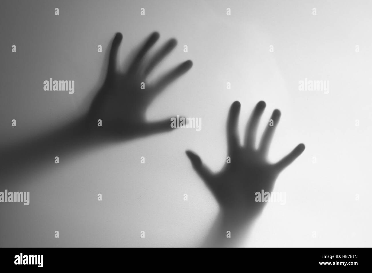 Silhouette einer Hand verwischen Stockfoto