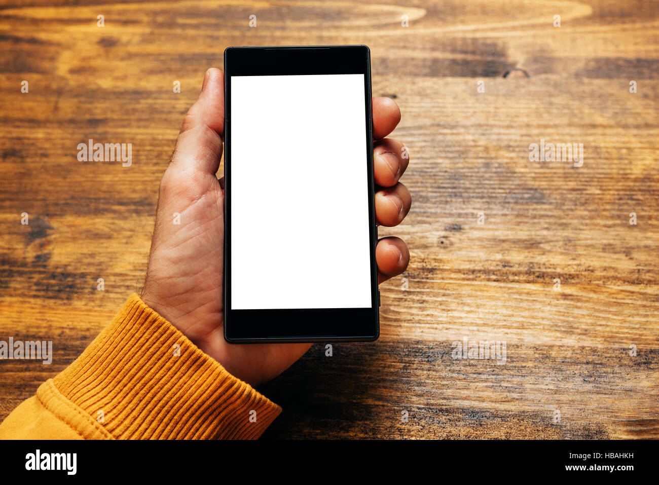 Mobile-Payment und Elektronik banking mit Smartphones, mock-up Bild der männliche Hand, die moderne stilvolles Gerät mit leeren Bildschirm als Textfreiraum Stockfoto