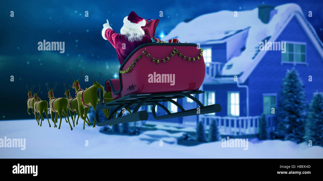 Zusammengesetztes Bild von Santa Claus in der Weihnachtszeit auf Schlitten fahren Stockfoto