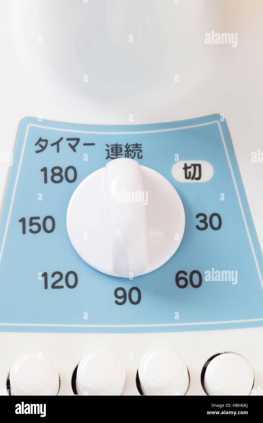 Analoger Timer Gerät der Bule und weißen japanischen Elektrolüfter Stockfoto