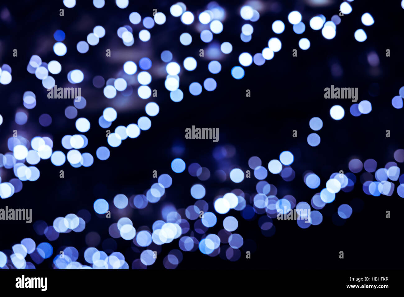 abstrakte verschwommene Urlaub Hintergrund mit blauen Lichter Punkte Stockfoto