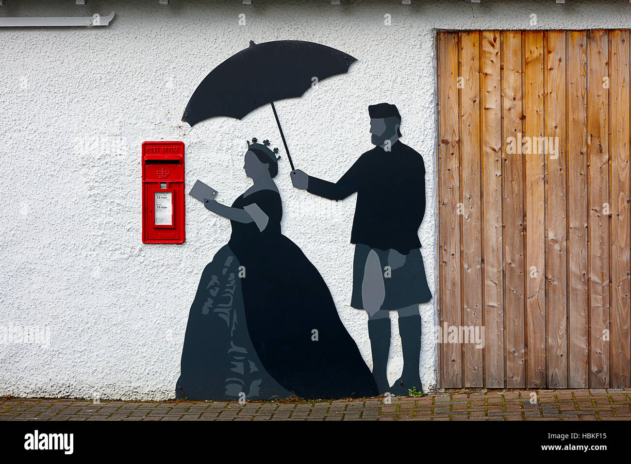 Königin Victoria mit Mann servent John Brown abbildenden Beitrag schreiben. Stockfoto