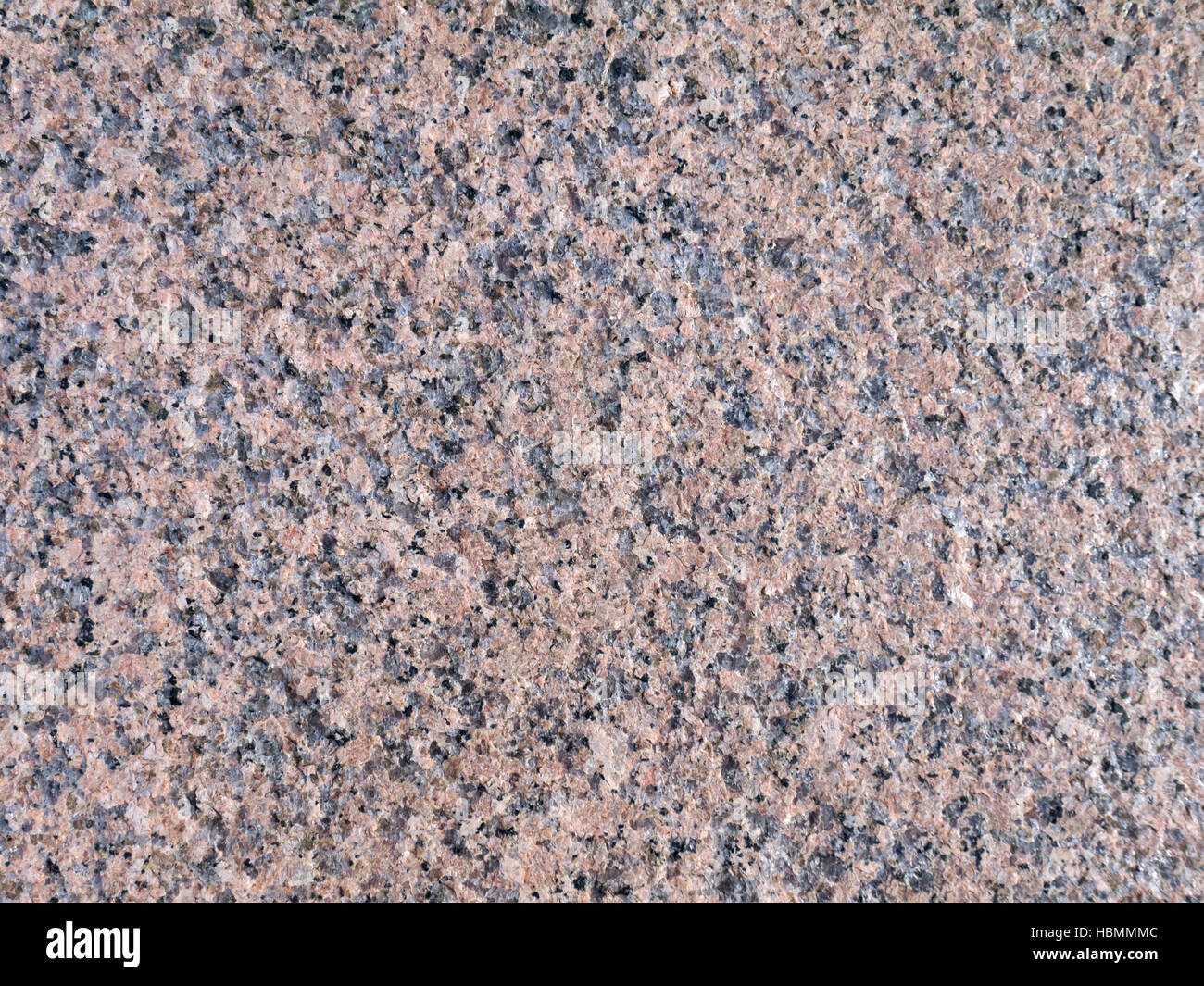 Rosa grau Granit Felsen Closeup Textur Hintergrund Stockfoto