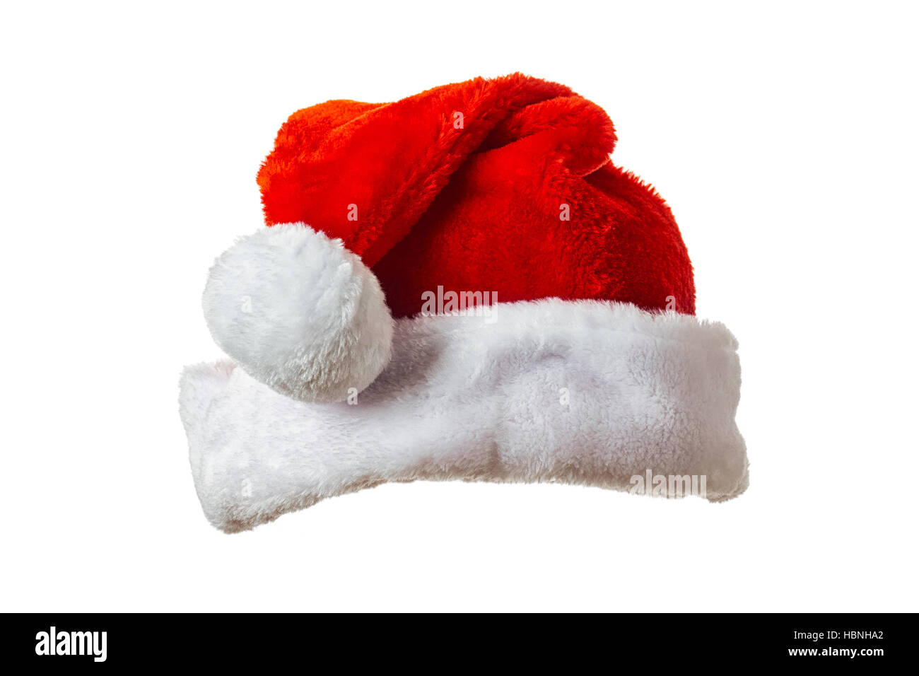 Weihnachtsmütze auf weiß Stockfoto