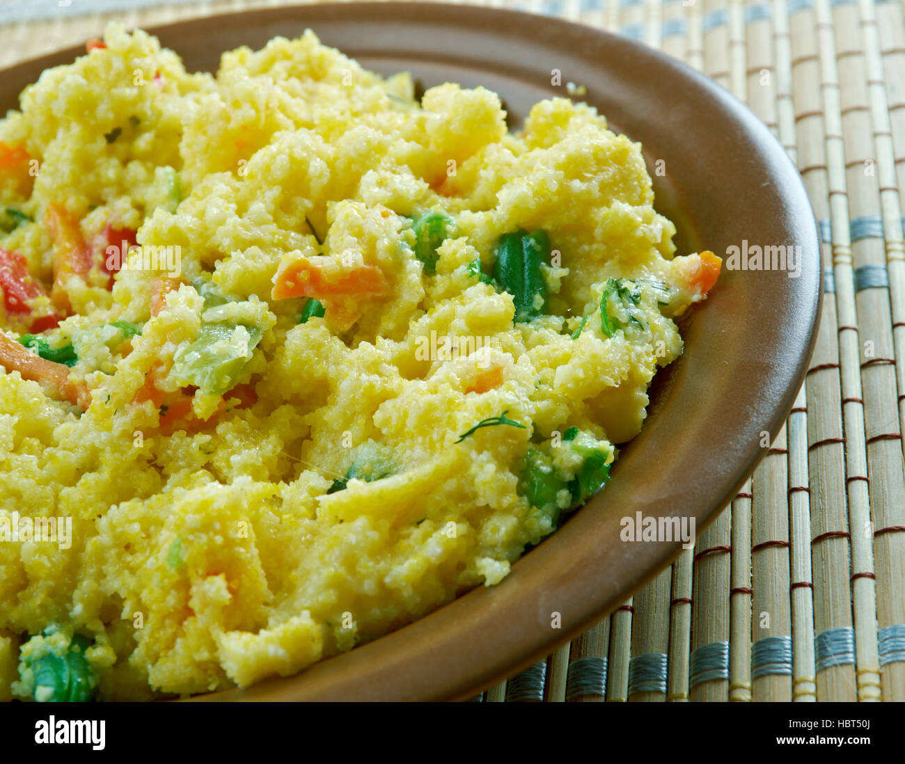 Upma n südwärts Inder Maharashtrian und Sri-Lanka-Tamilen Frühstück Teller Stockfoto