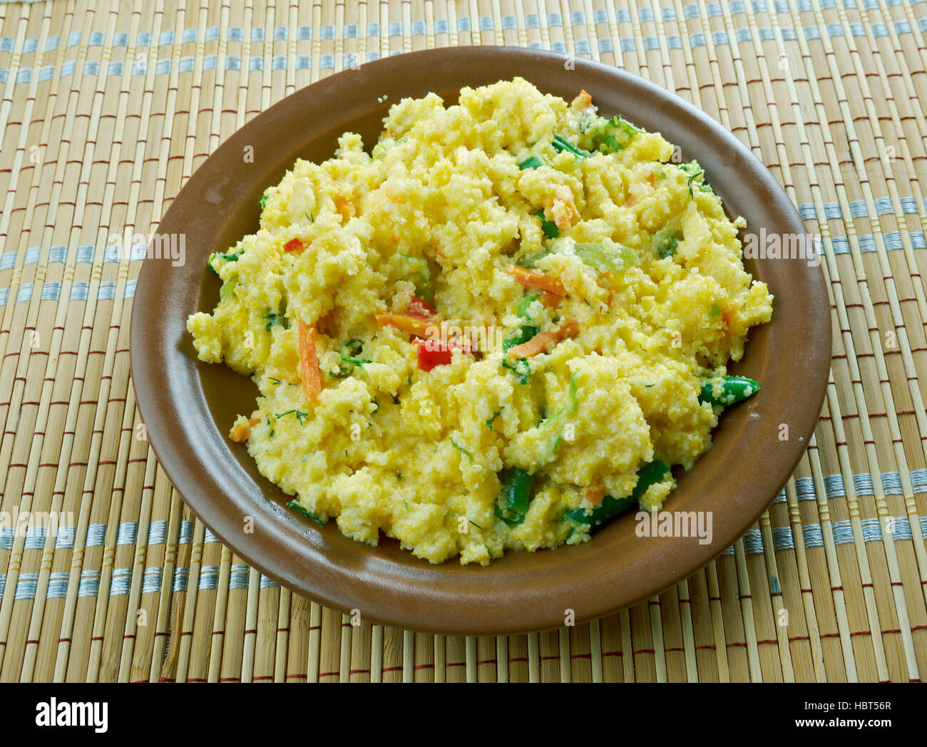 Upma n südwärts Inder Maharashtrian und Sri-Lanka-Tamilen Frühstück Teller Stockfoto
