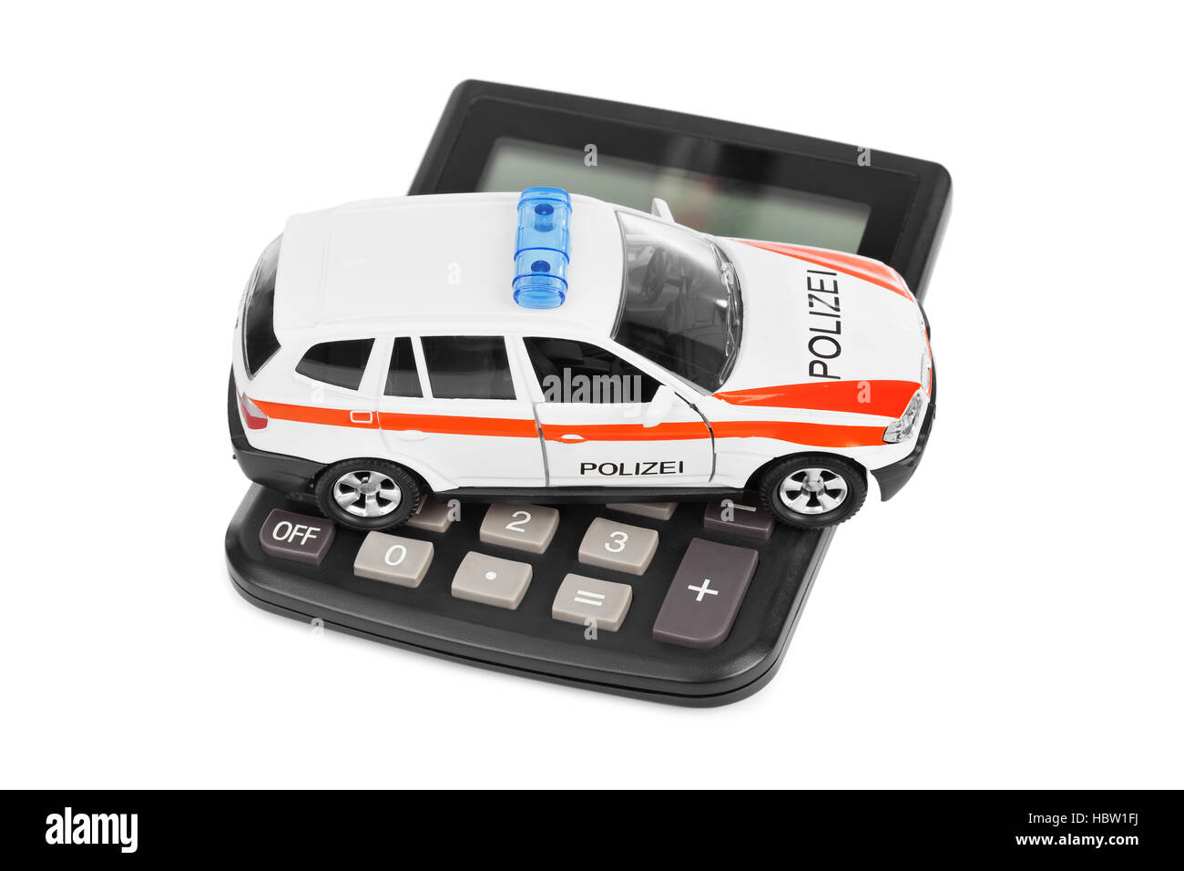 Rechner und Spielzeug Polizeiauto Stockfoto