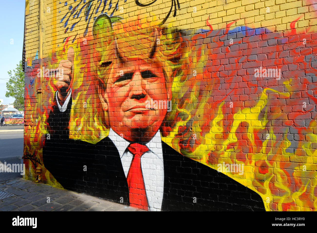 Donald Trump (mit Teufel Hörner) Graffiti gemalt auf eine Wand in Melbourne, Australien Stockfoto