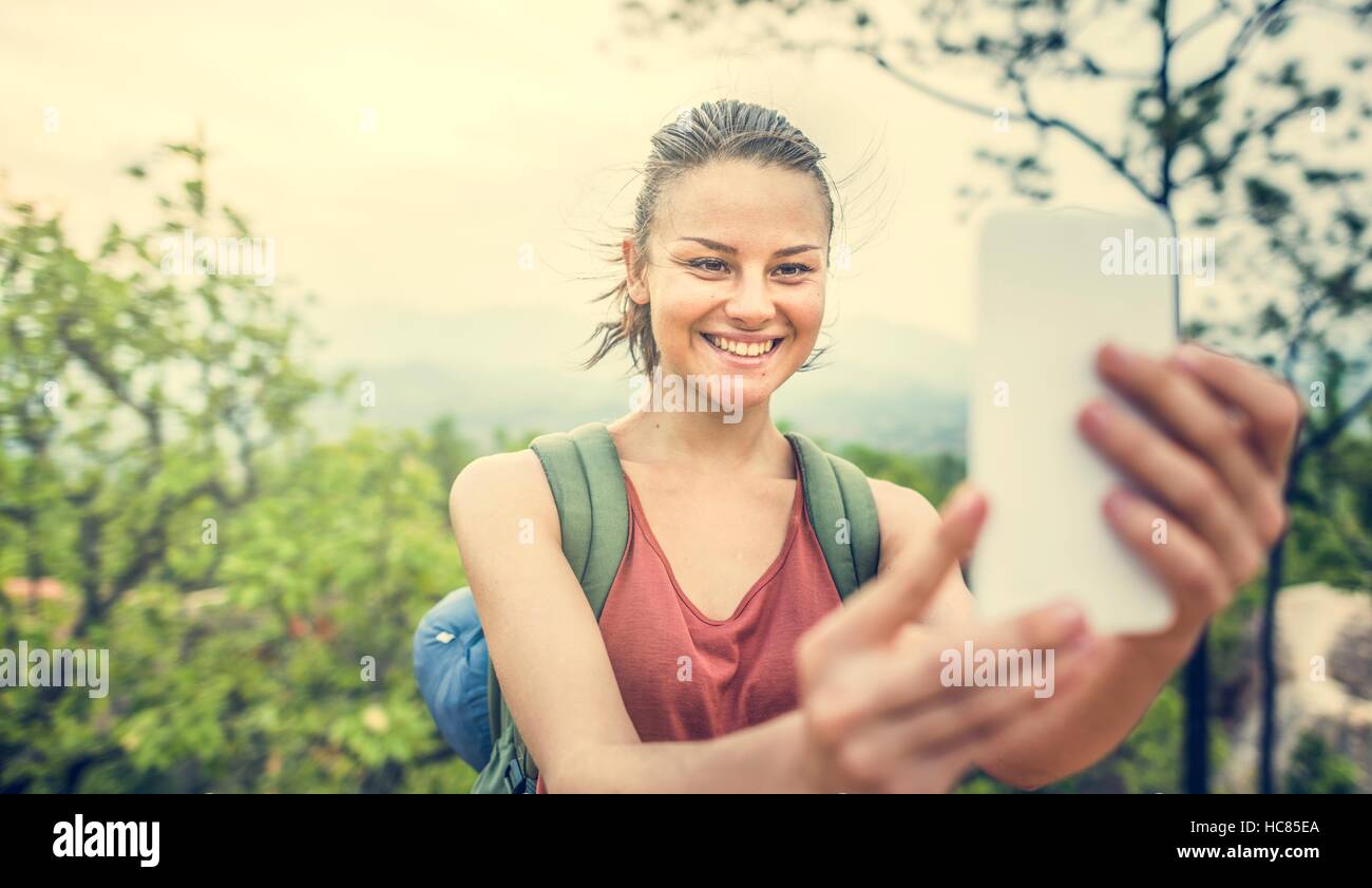 Frau nehmen Bilder Gerätekonzept Stockfoto