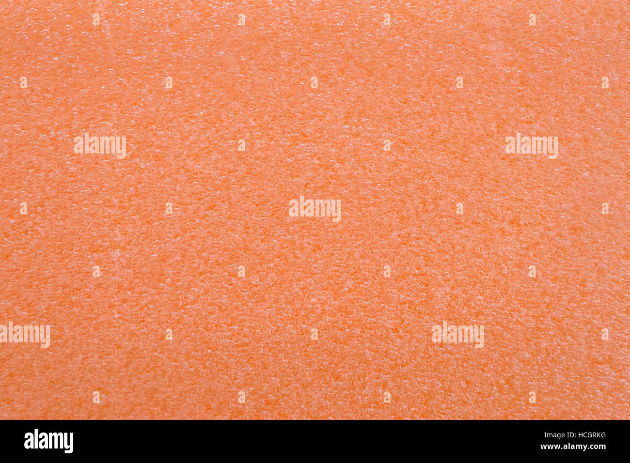 Orange Pfirsich sprudelte Oberfläche. Struktur und Hintergrund Stockfoto