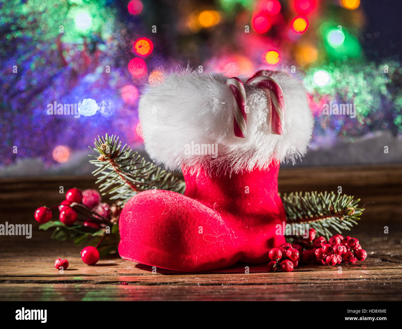 Weihnachts-Strumpf und Zuckerstangen. Weihnachten-Symbole. Stockfoto