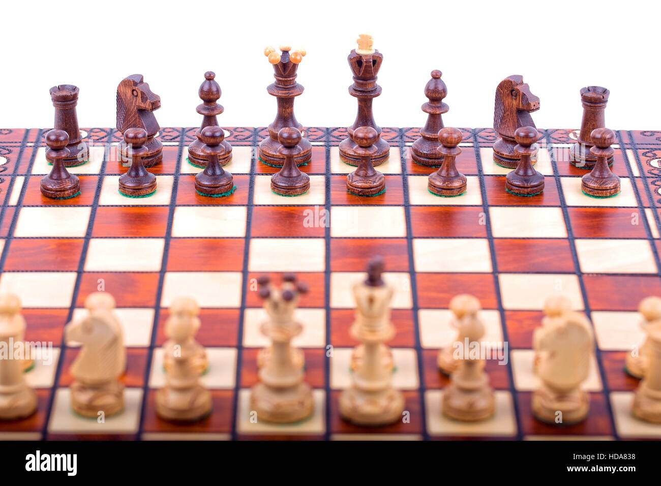 Schachfiguren auf dem Brett Stockfoto