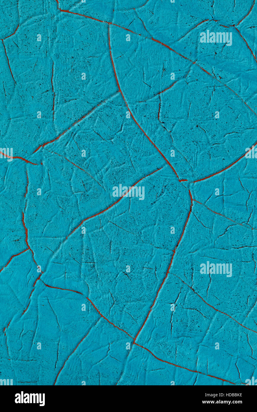 Abblätternde Farbe und Rost an einer Wand in Nahaufnahme Stockfoto