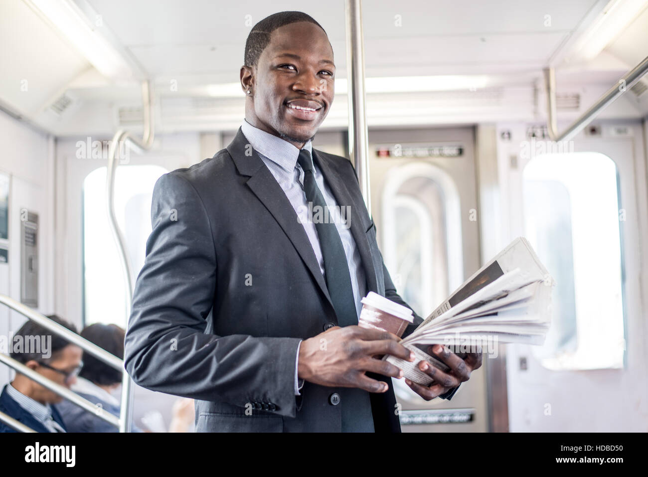 Geschäftsmann in vollständigen Anzug in der New Yorker u-Bahn metro Stockfoto