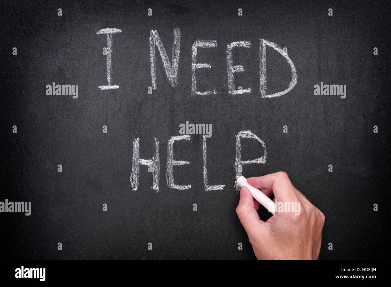 Handzeichnung ich brauche Hilfe auf Tafel. Vignette. Hautnah. Stockfoto