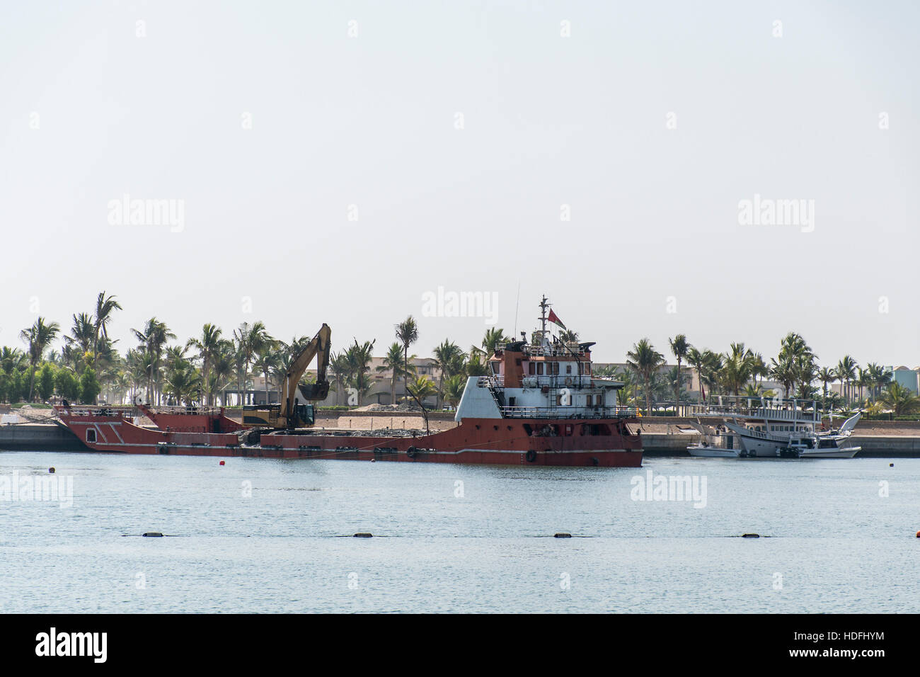 Boot-Bagger schaffen Land Küste im souligen Bay Salalah Oman 3 Stockfoto