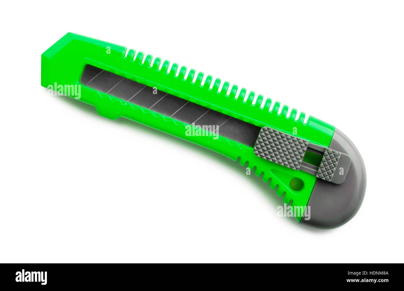 Grüne Schreibwaren Messer isoliert auf weißem Hintergrund Stockfoto